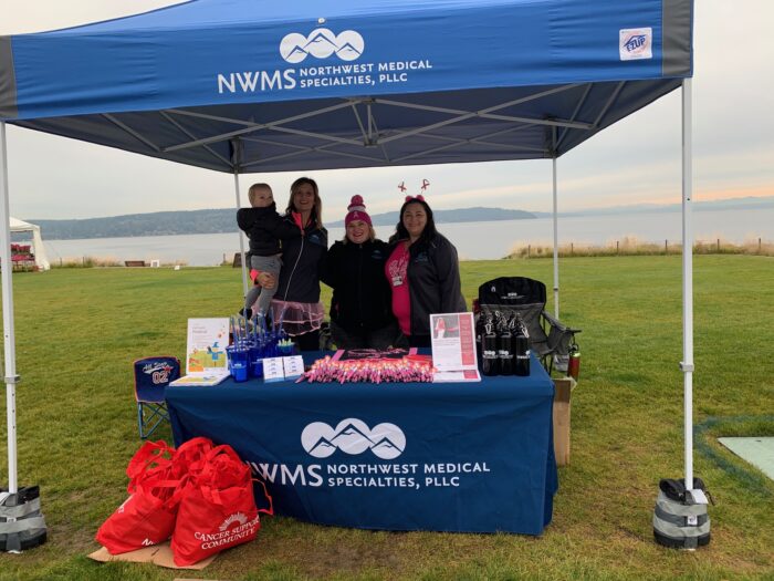 making strides against breast cancer event booth